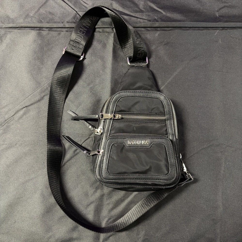 Madden NYC Black Nylon Sling Bag Zippers Pockets Silver Hardware Adjustable